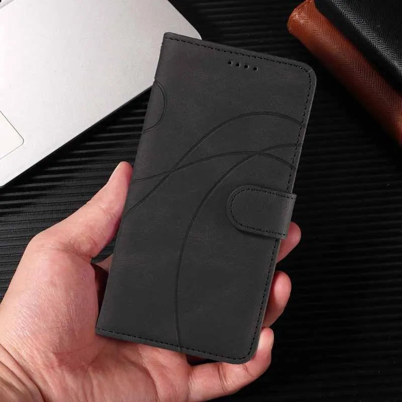 etui telephone noir en main table noire
