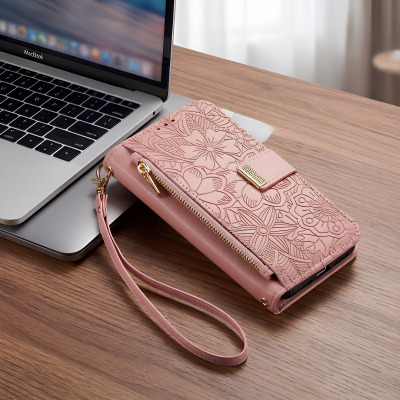 etui telephone rose sur table